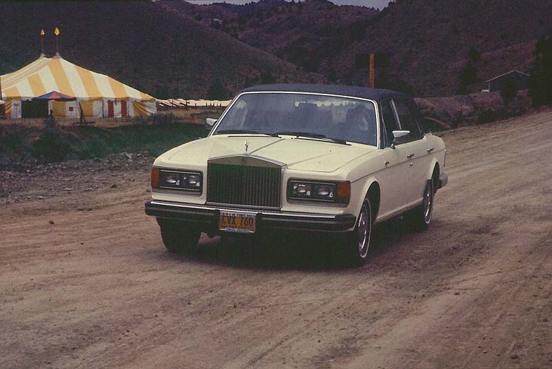 Bhagwan Driving White Rolls-Royce